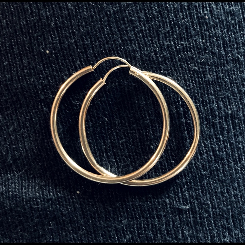 14k gold hoop earrings. $40 obo.